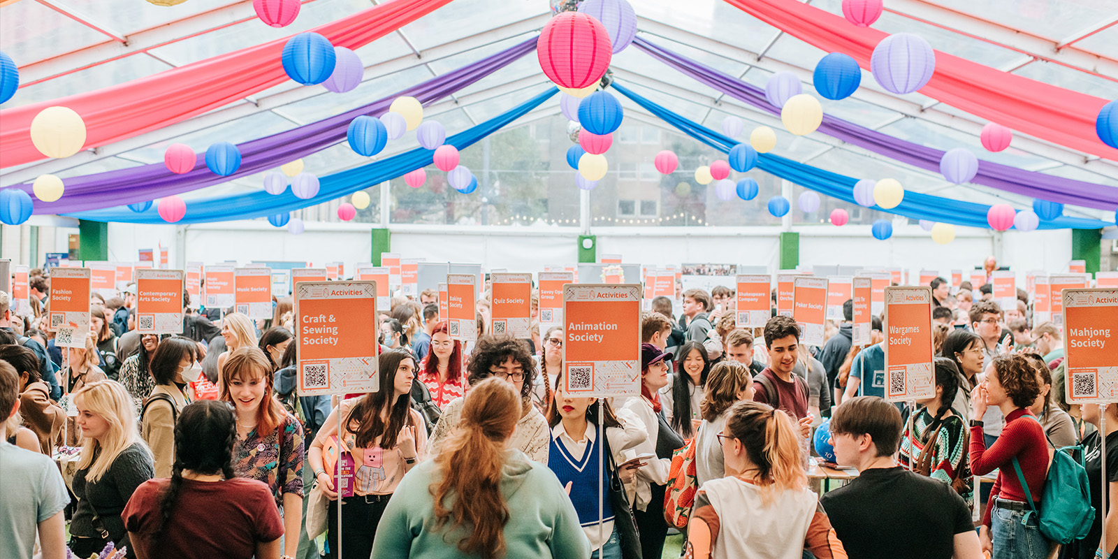 Students exploring university society options