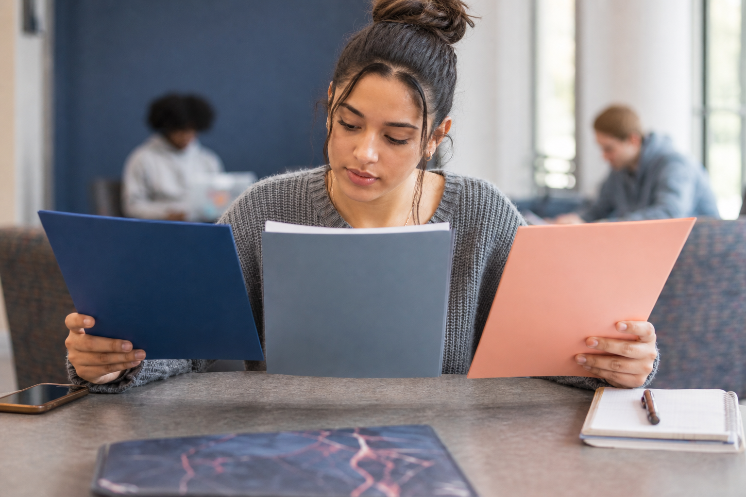 College student comparing confidential support and formal campus reporting routes