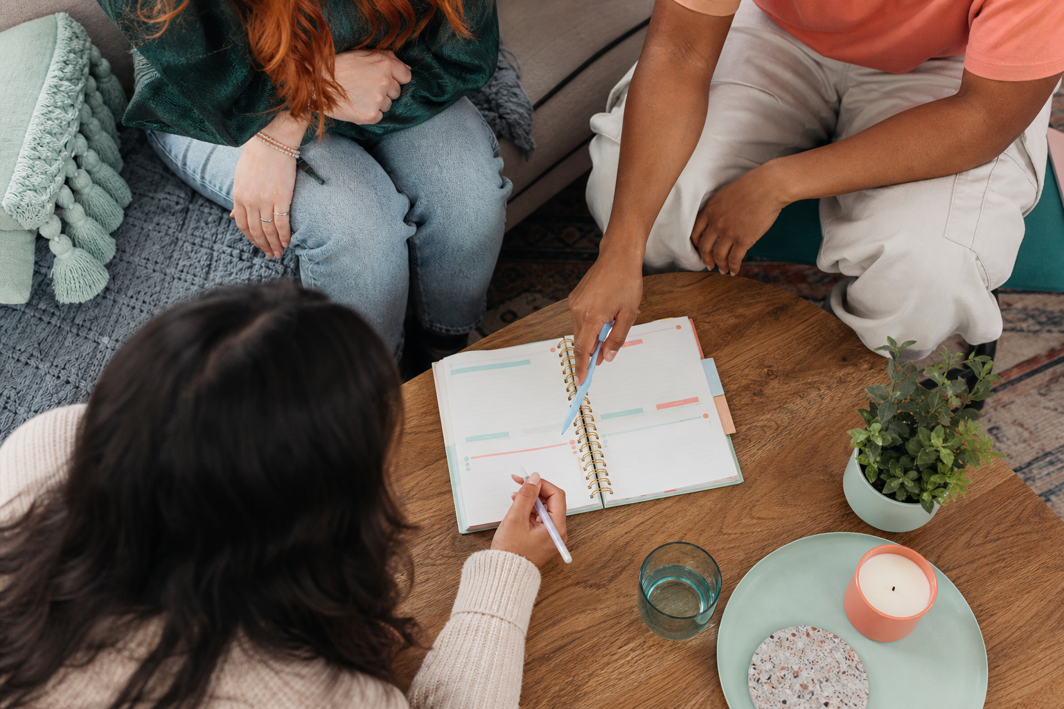 Roommates updating a simple shared living agreement after talking